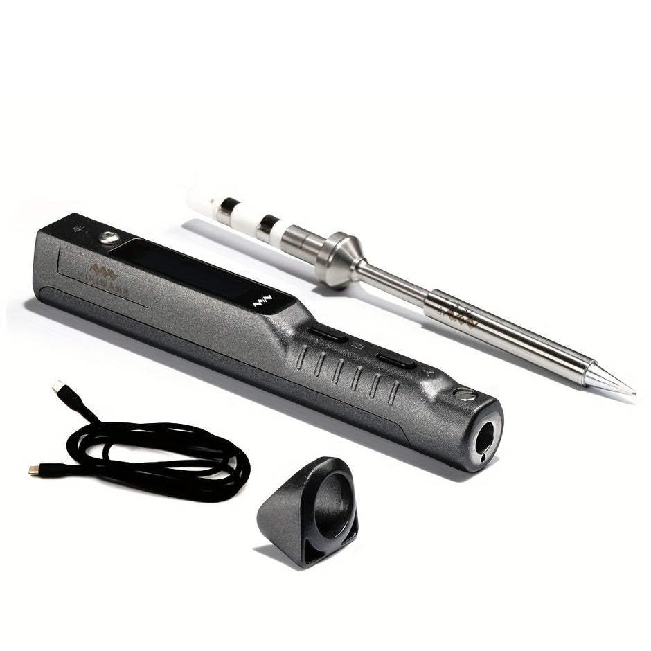 TS101 smart soldering iron with digital display, interchangeable tip, USB-C power cable, and stand — compact and precise tool for makers.